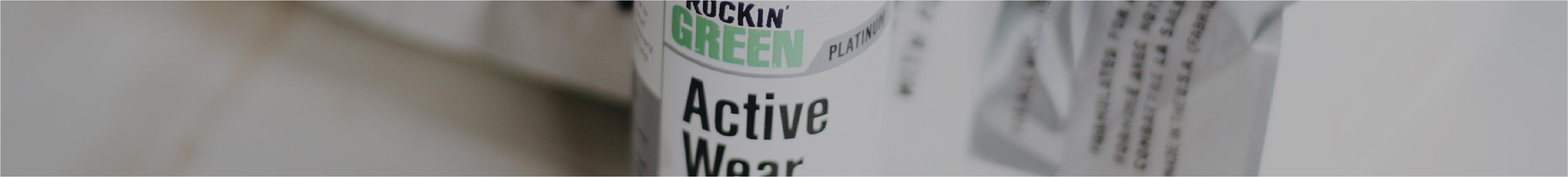 Close-up of a white container with Active Wear and GREEN visible on the label.