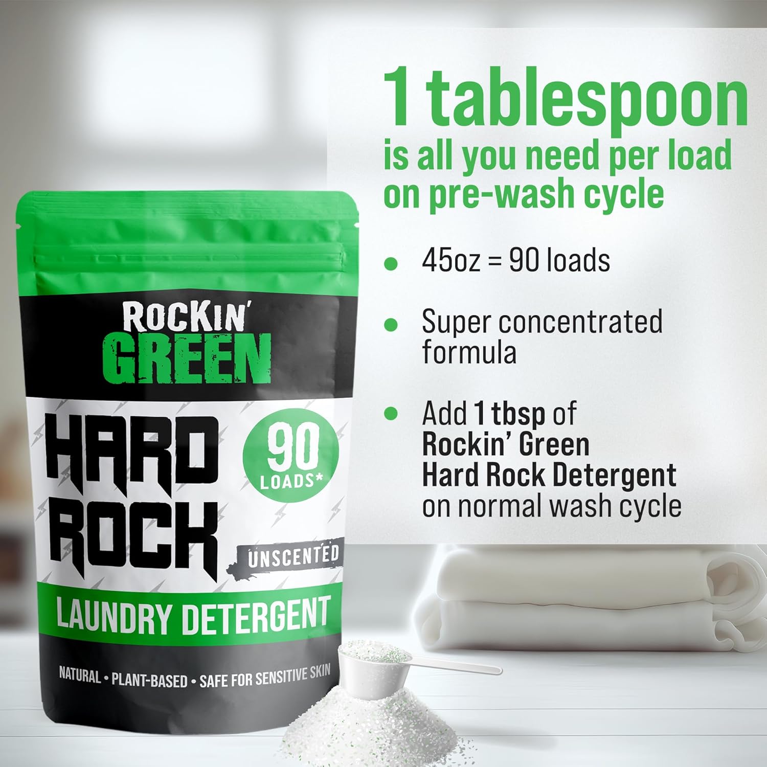 Rockin Green Hard Rock Laundry Detergent bag beside a scoop and folded towels. Unscented formula.