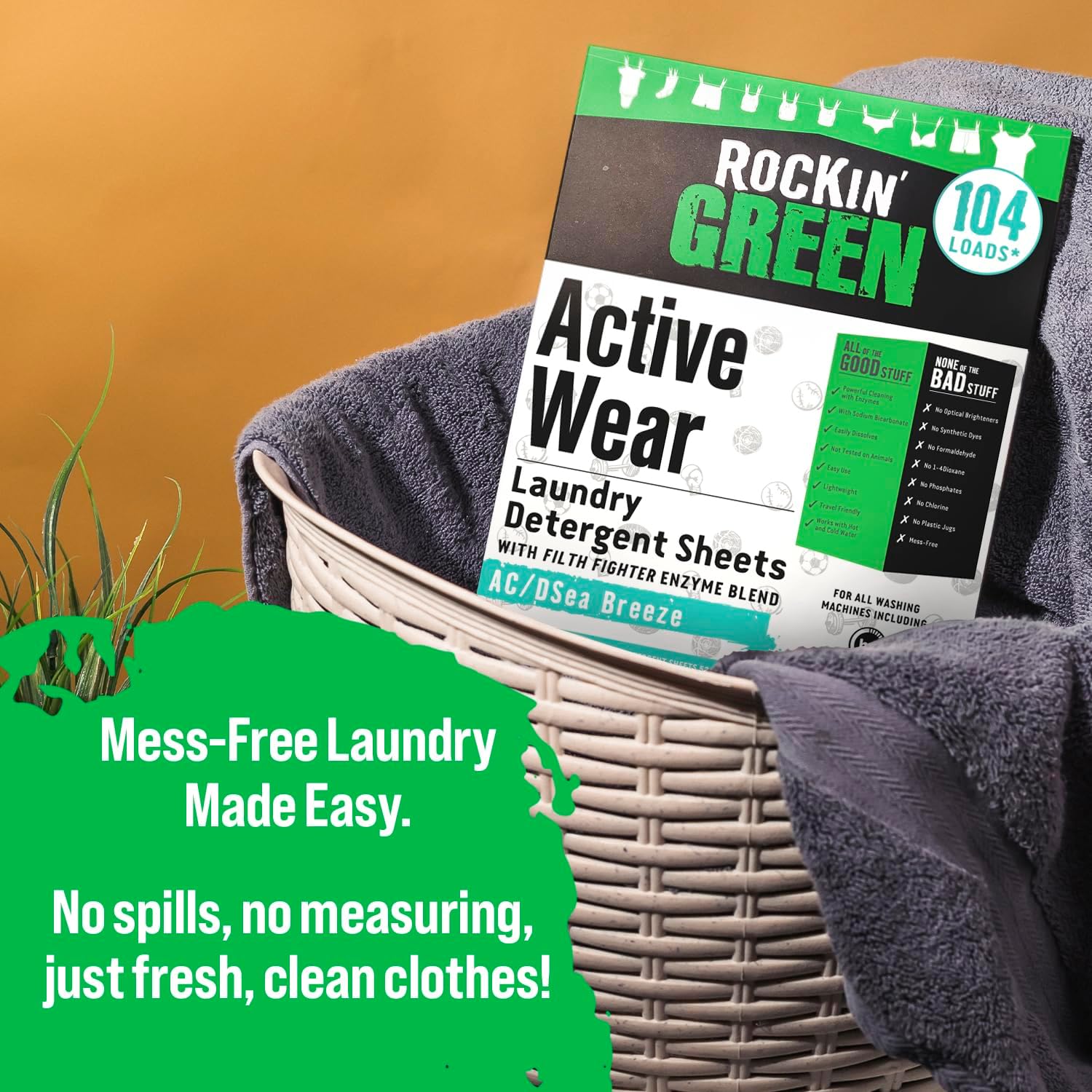 Rockin Green Active Wear AC/DSea Breeze detergent sheets in a basket with towels for easy laundry.