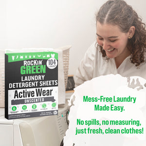 Woman smiling by washing machine with Rockin Green Travel Laundry Detergent Sheets, Unscented.